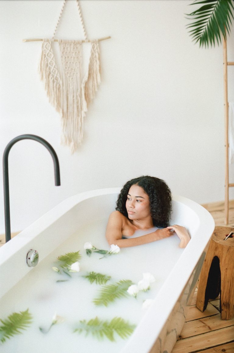 Beautiful Lady Having A Milk Bath And Thinking In Empty Room